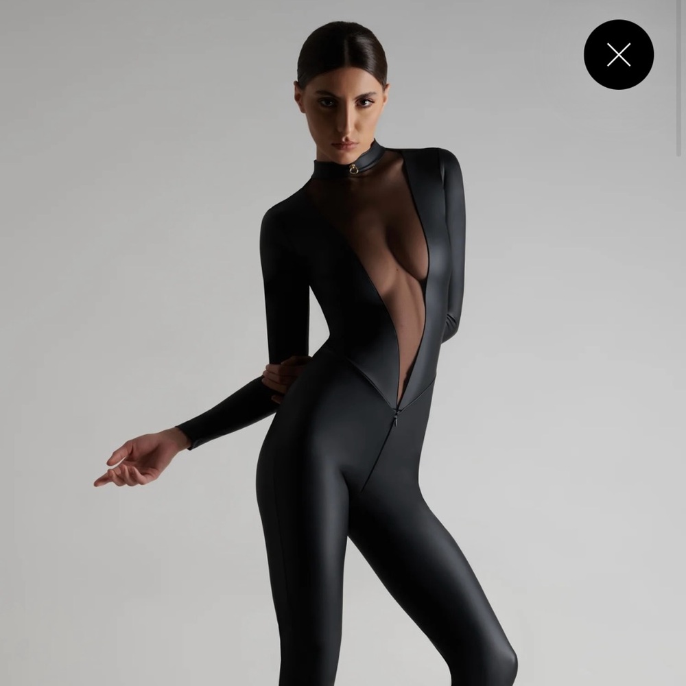 This is a Maison Close Chambre Noire catsuit in black.